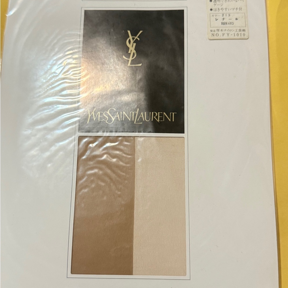 Yves Saint Laurent Black and Gold Fabric